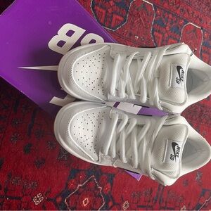 Brand new, never worn. Nike White/Black SB Dunk Low Pro with box